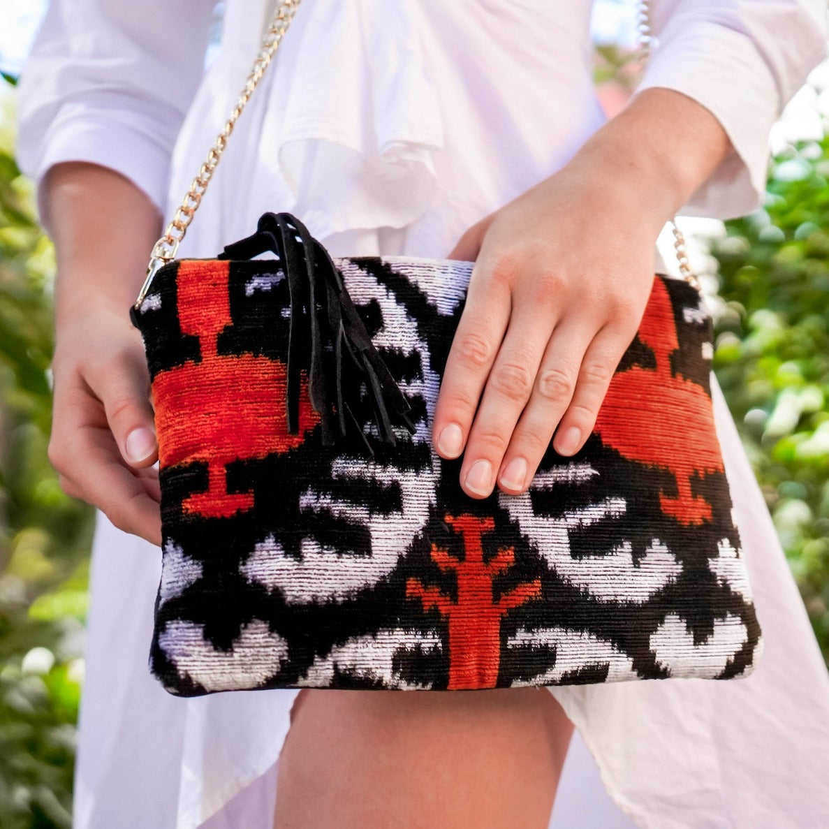 Black and red clutch bag online